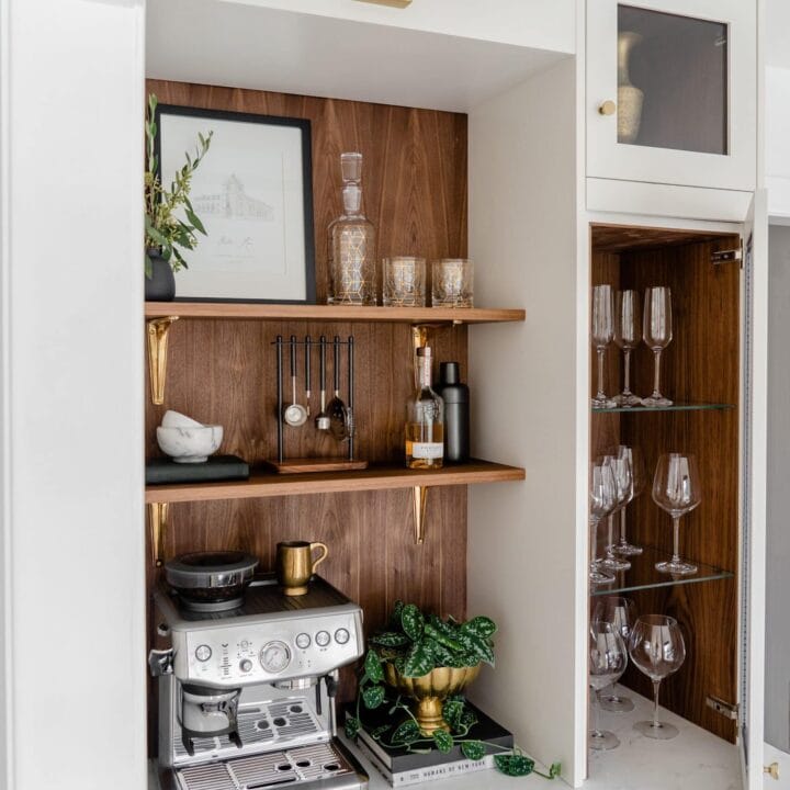 Image for Rich Wood Shelves, Gold Accents & Glassware Displays