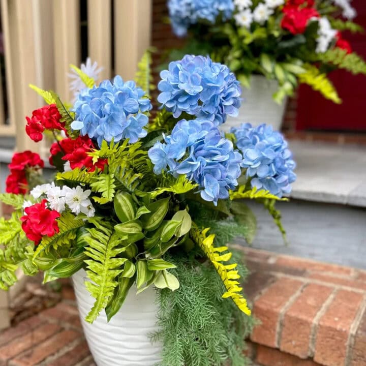 Image for White Planters With Vibrant Flowers & Greenery