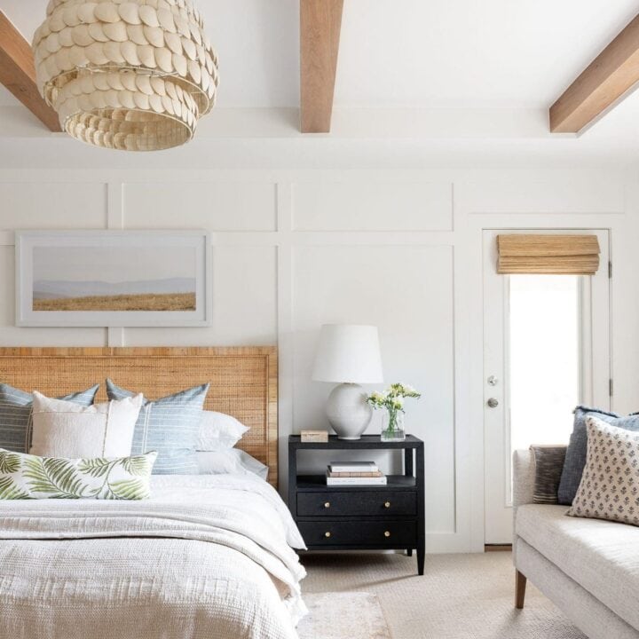 Image for Natural Wood Beams, Rattan Headboard, & Layered Bedding