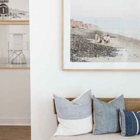 Image for Bench Topped With Coastal-Themed Pillows + Framed Beach Photo