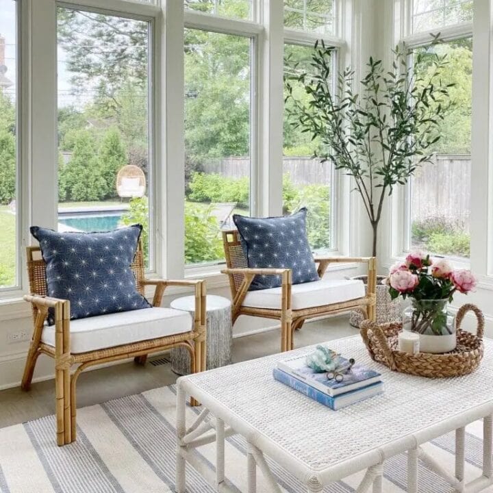 Image for Rattan Chairs With Deep Blue Pillows + Light Striped Rug