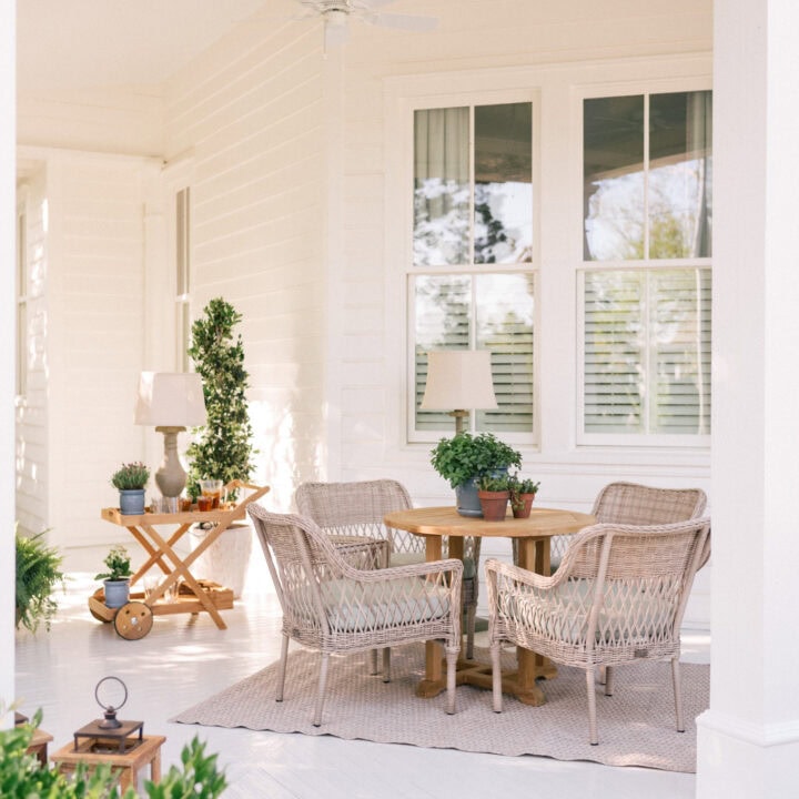 Image for Wooden Serving Cart With Potted Plants & Wicker Chairs