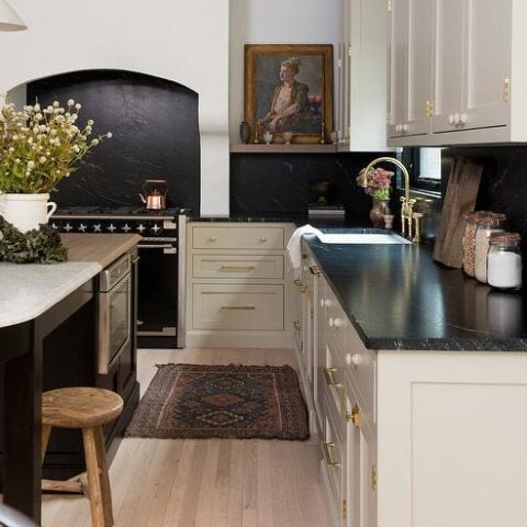 Image for Sleek Black Range & Countertops + Soft Beige Cabinetry