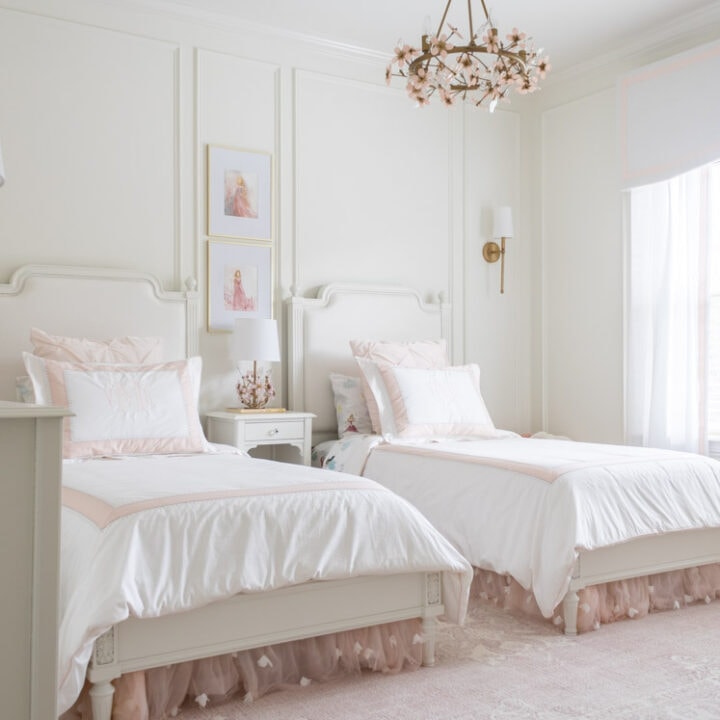 Image for Floral Pink Chandelier & White Beds With Ruffled Pink Details
