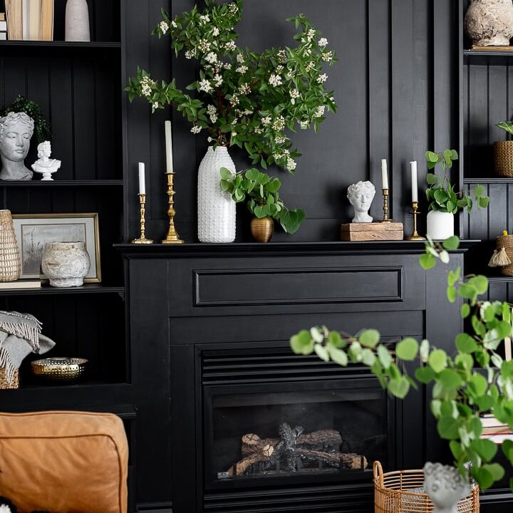 Image for Dark Fireplace Wall With Greenery + Candles