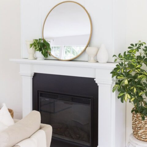 Image for Clean White Fireplace With Simple Gold Mirror