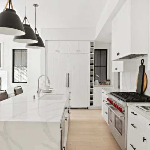 Image for Crisp White Cabinets & Backsplash + Black Accents