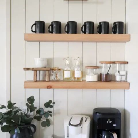 Image for Open Shelves With Black Mugs, Simple Jars, & Syrups