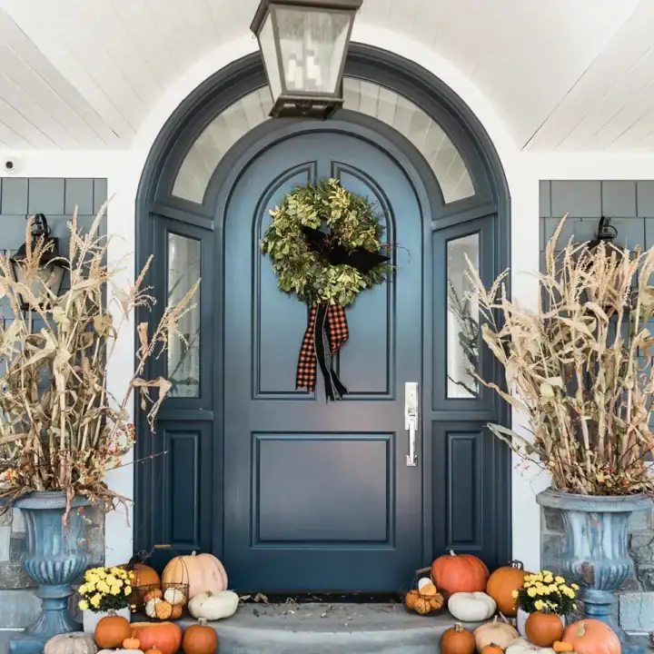 Image for Navy Door, Bright Orange Pumpkins, Dried Corn + Black and White Checkered Rug