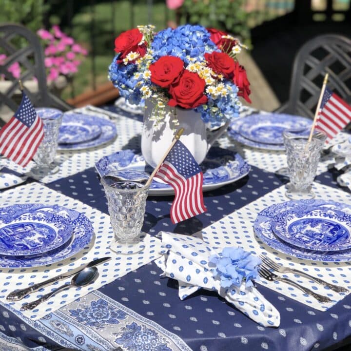 Image for Mixed-Pattern Tablecloth, Blue Toile Plates & Patriotic Floral Arrangement