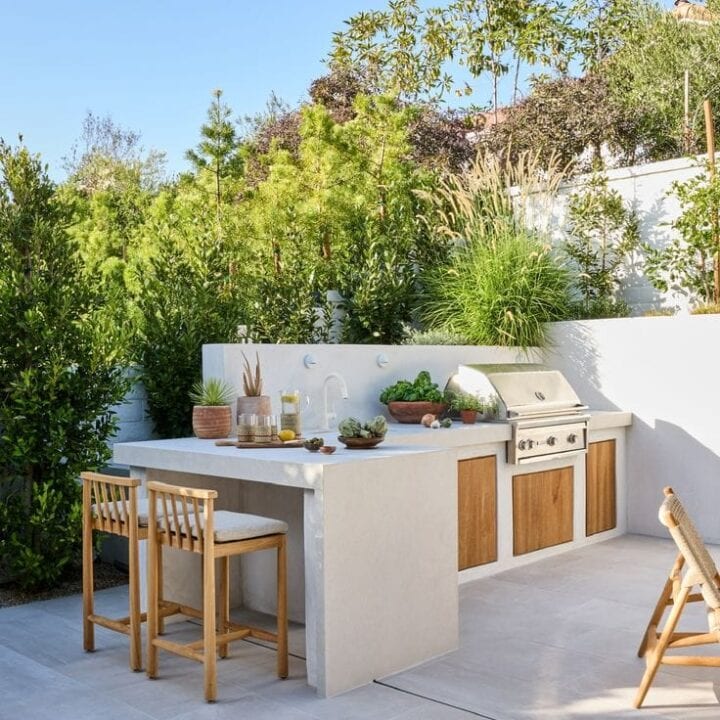 Image for Bright Outdoor Grill Area With White Walls & Wood Cabinets