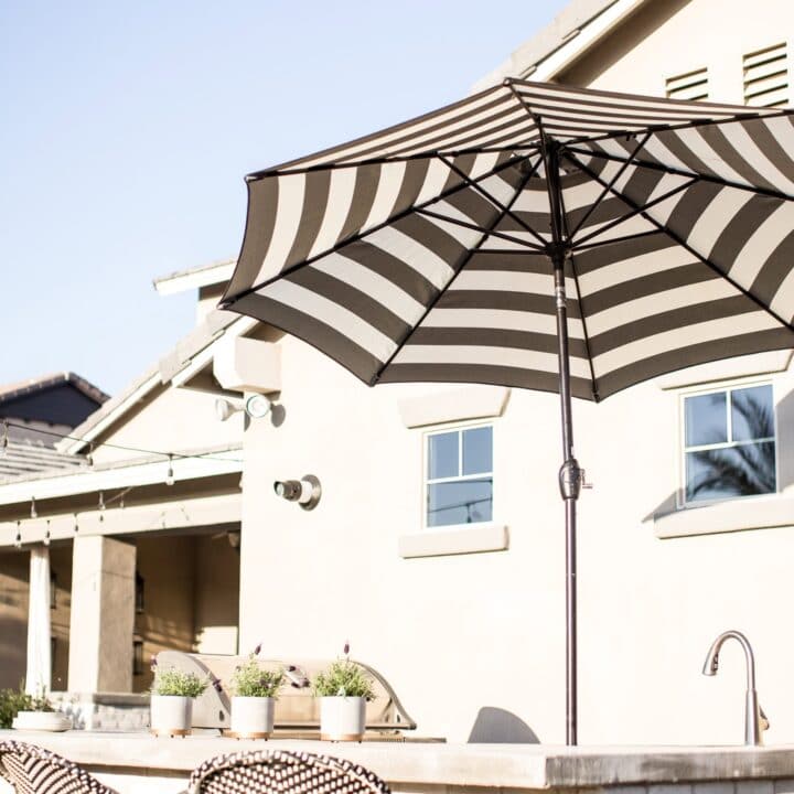 Image for Sunny Grill Area With Striped Umbrella