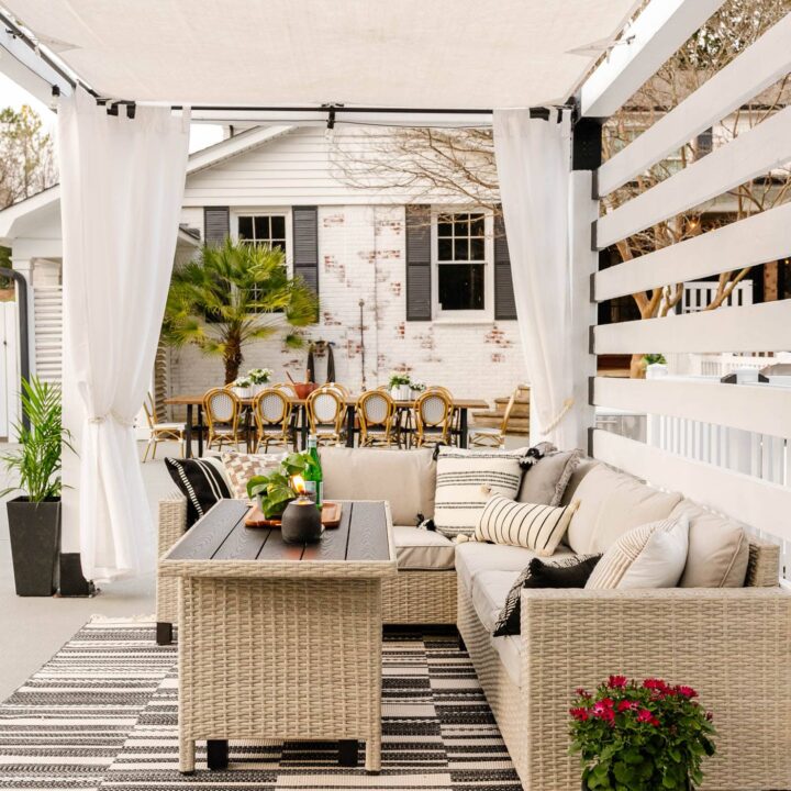 Image for Neutral Tones + Cozy Wicker Seating And Patterned Rug