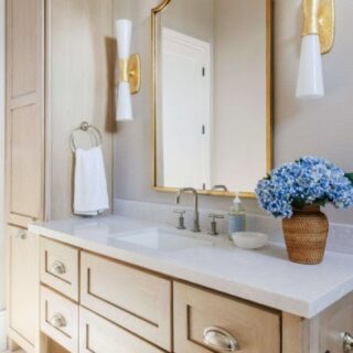 Image for Warm Wood Vanity, Gold Accents & Blue Flowers