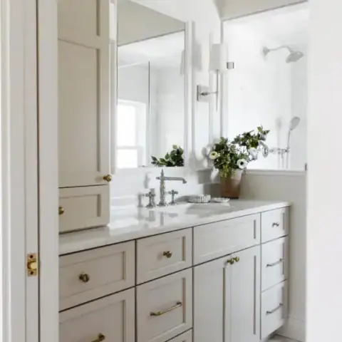 Image for Creamy Beige Cabinets With Gold Knobs + Marble Counters