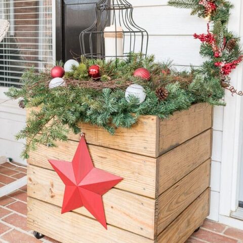 Image for Wooden Planter With Evergreens and Red Star Decor