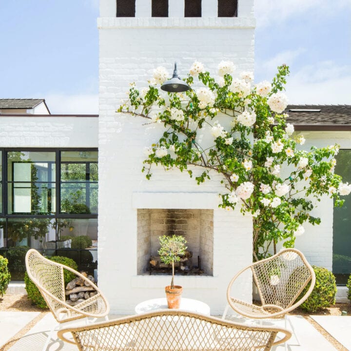 Image for White Fireplace + Woven Chair Seating