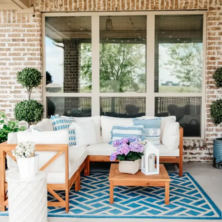 Image for Blue Rug, White Sectional & String Lights