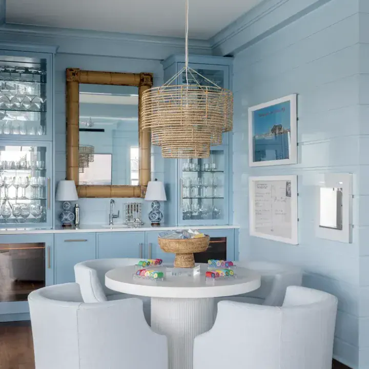 Image for Soft Blue Walls + Round White Table & Woven Accent